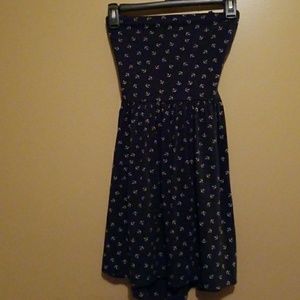 Dress with anchors with straps